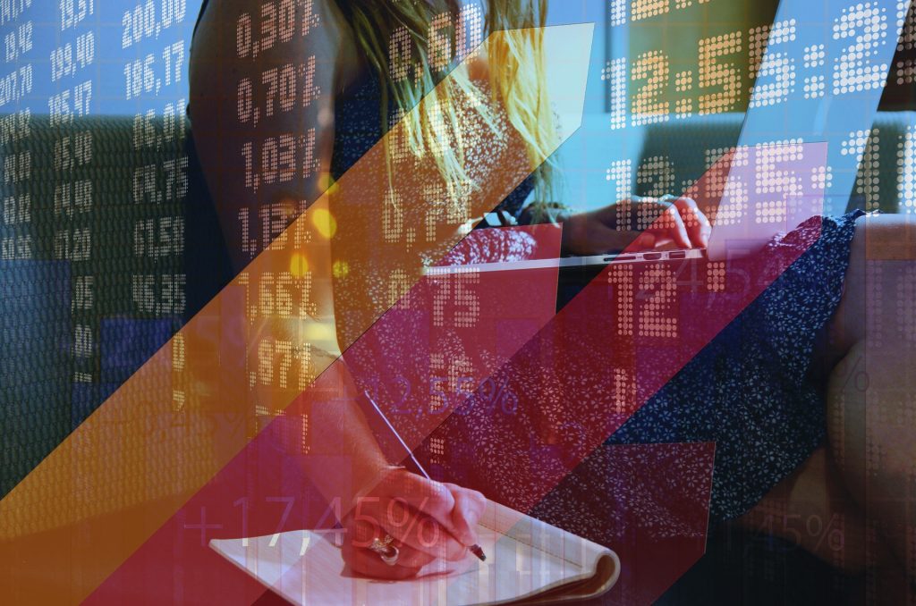 Growth strategy arrows showing progression from stages 1 to 4 with a woman casually writing notes on a notepad in the foreground, representing business planning and structured growth.